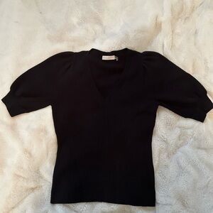 Ramy Brook knit top with elbow length puff sleeves.